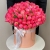 Композиция в шляпной коробке из 113 пионов Корал Шарм в Пущино